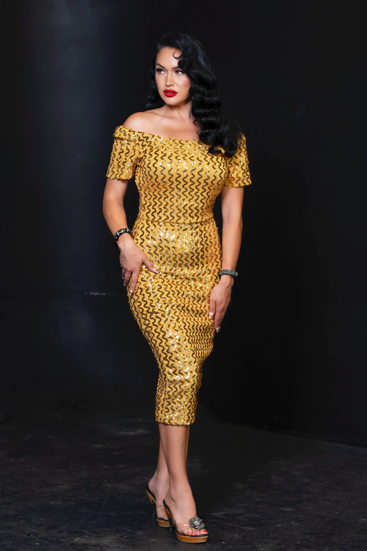 autumn dressed up in gold The stunning Autumn gown just dropped in gold and she is everything